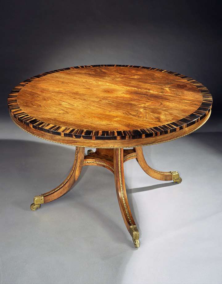 A REGENCY BRASS MOUNTED ROSEWOOD CENTRE TABLE ATTRIBUTED TO GILLOWS